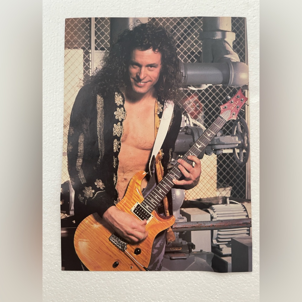 Vintage pinup of Ted Nugent with Guitar